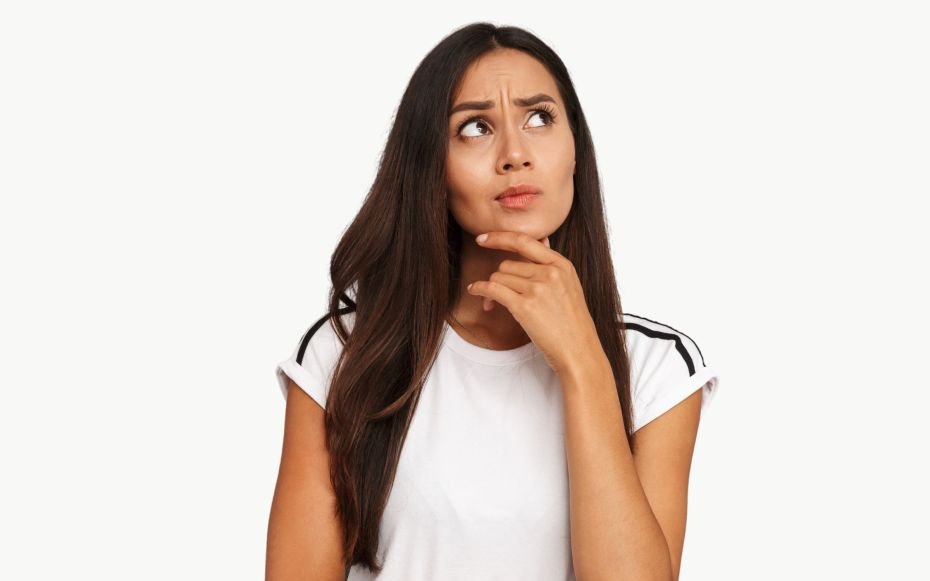 Woman holding chin thinking about what to do for IT help?